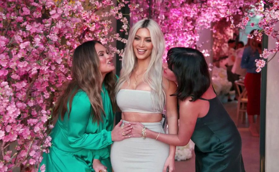 Kim celebrates her baby shower with friends and family.