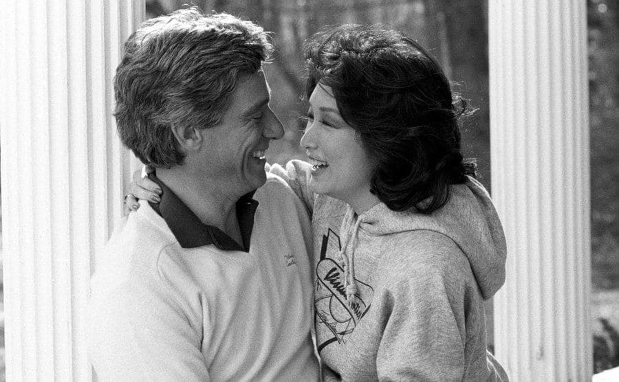 A dated photo of Povich smiling at his wife.