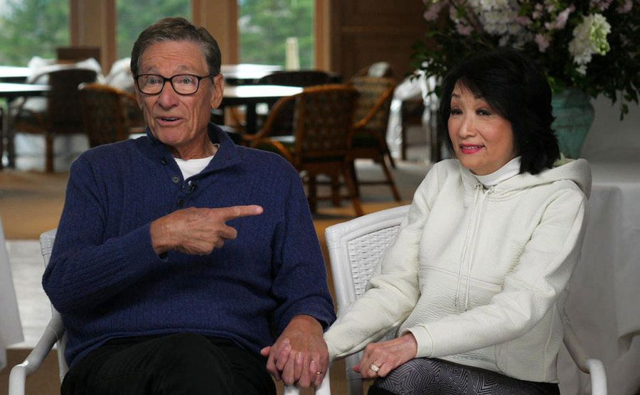 A still of Maury Povich and Connie Chung during an interview.