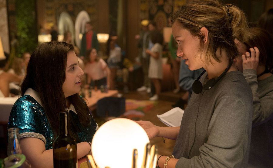 Olivia Wilde talks to Beanie Feldstein on the set of Booksmart.