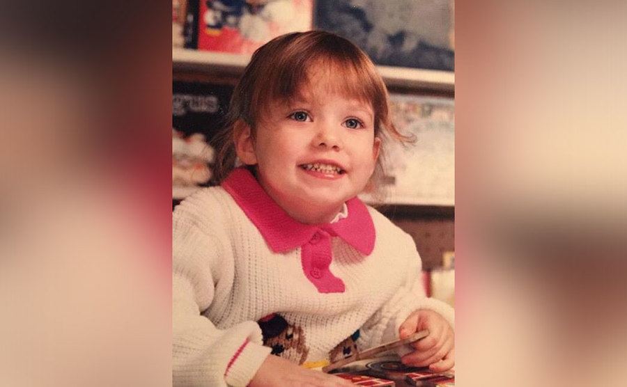 A photo of Olivia Wild as a child.