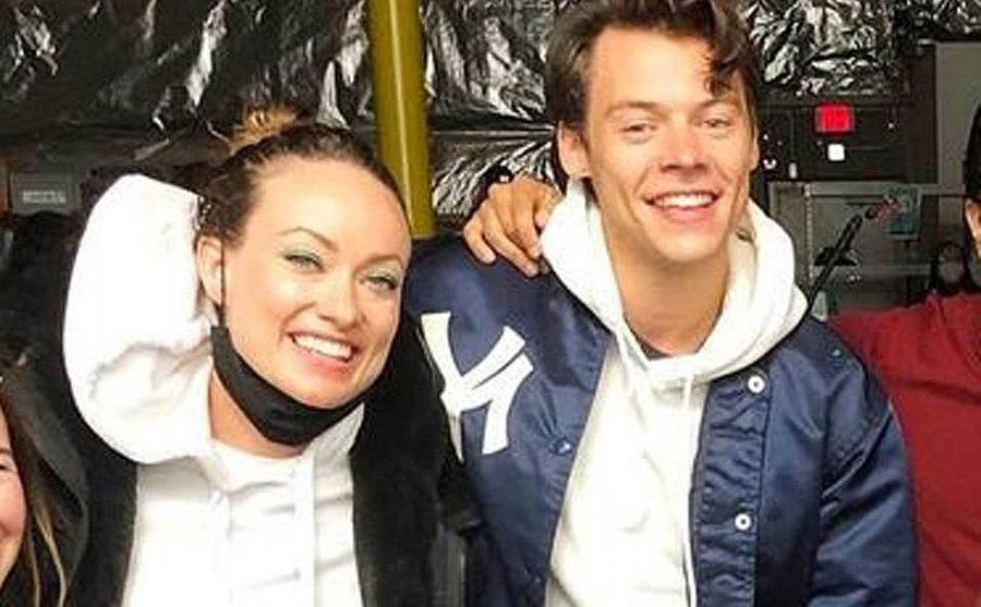 Harry and Olivia pose together backstage.