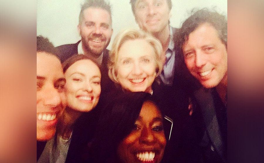 A group selfie of Olivia Wilde, Hillary Clinton, Zach Braff, and others.