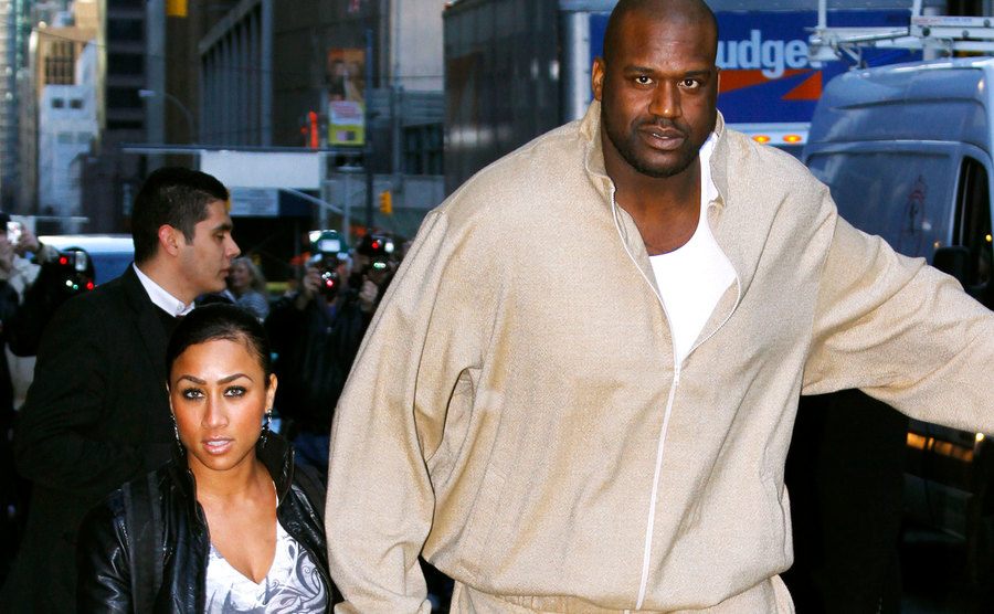 Nicole “Hoopz” Alexander and O’Neal walk the street.