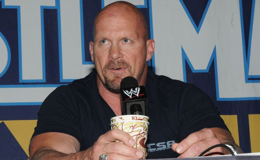 A photo of Steve talking to the media.