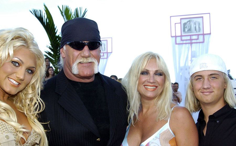 The Hogan family poses for the press.