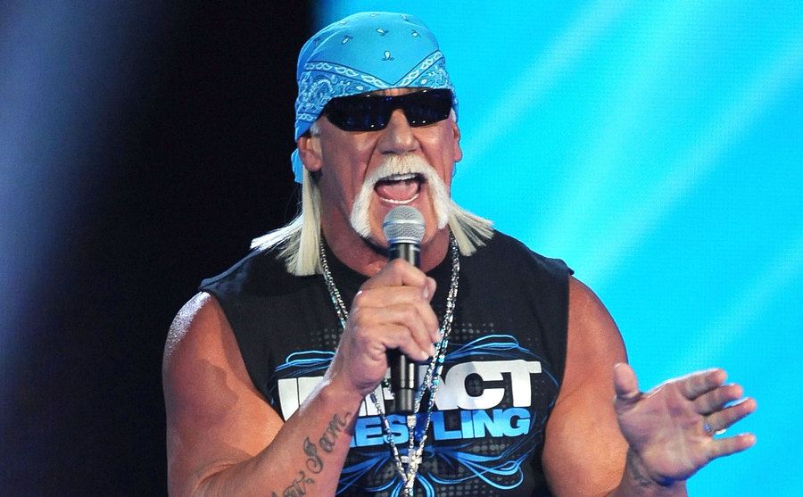 Hulk Hogan speaks on stage.