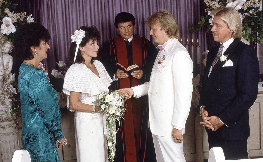 Joan Collins marries Peter Holm in a private ceremony at the Little White Wedding Chapel on the Las Vegas Strip.