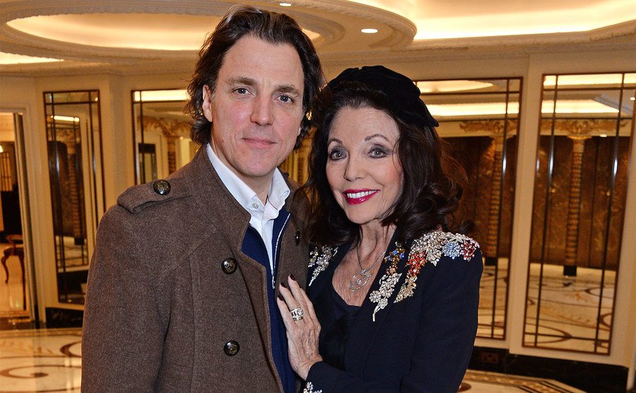 Alexander Newley and Dame Joan Collins attend a festive afternoon tea.