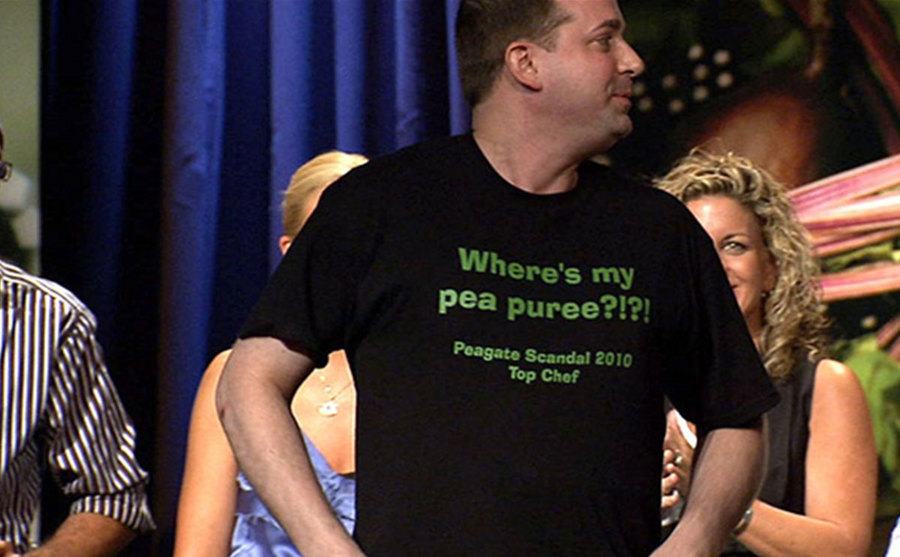 A still of Cotton wearing a t-shirt that reads Where’s my pea puree?!?!