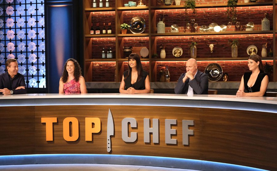 A closeup on the judges in a still from the show.