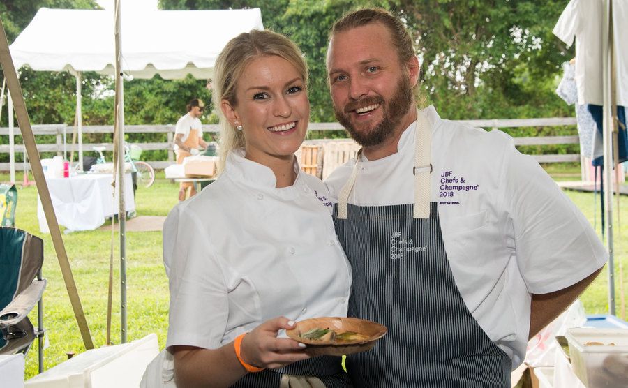 Jeff McInnis and Janine Booth pose for a picture during an event.