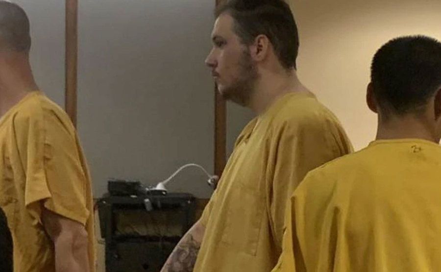 An image of Schilmiller in handcuffs.