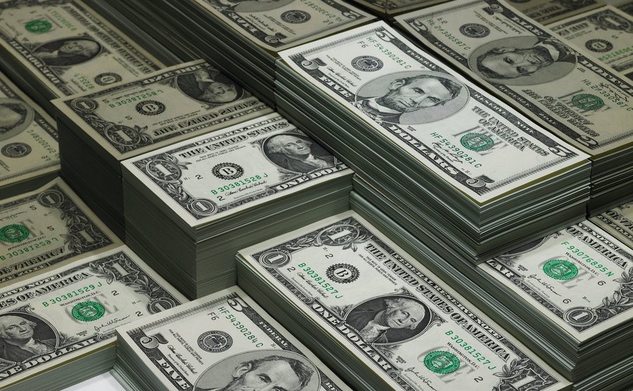 Piles of dollar bills.