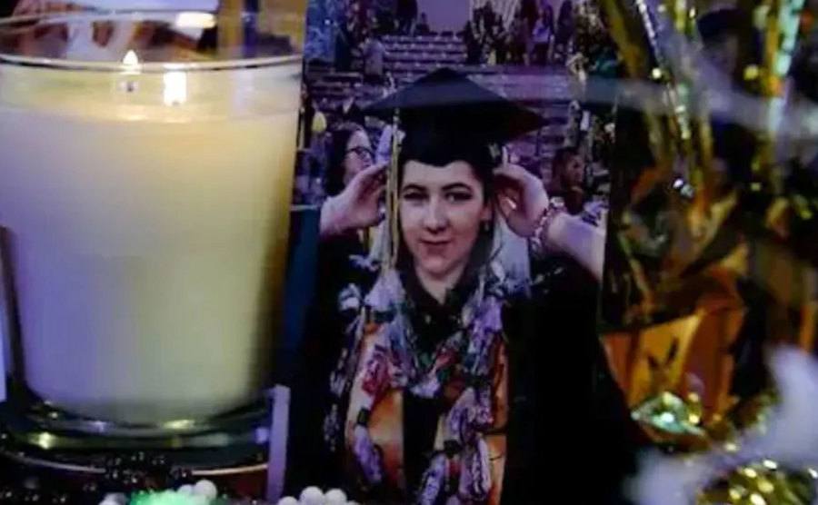 A framed picture of Cynthia during her graduation.