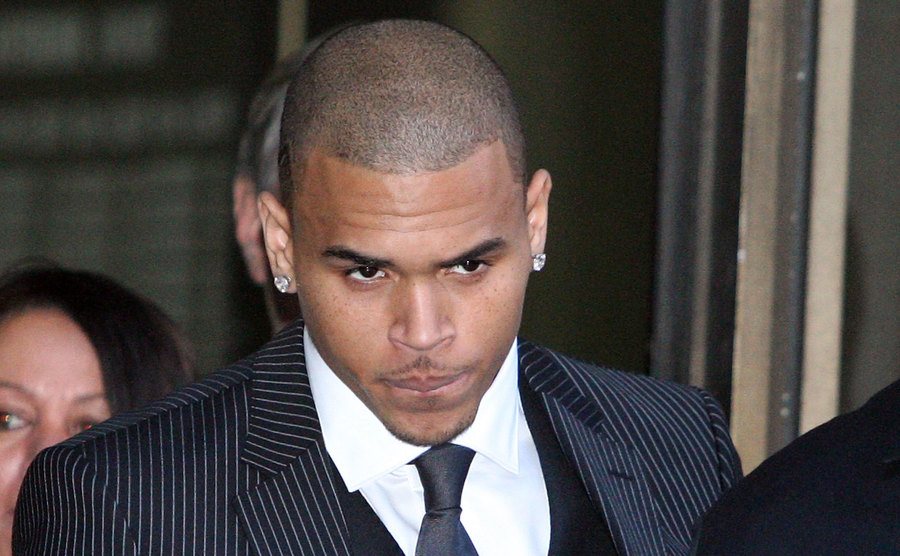 An image of Chris Brown leaving the courthouse.