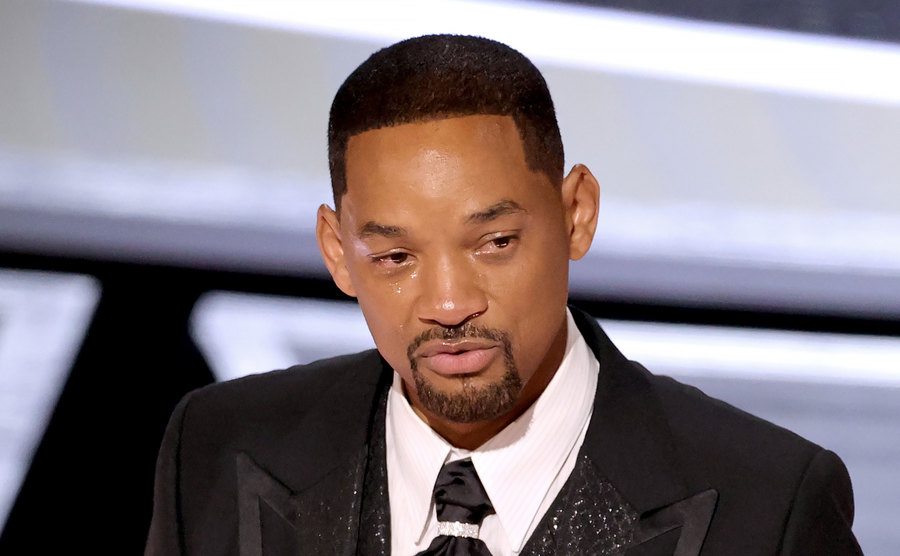 Will Smith cries on stage.