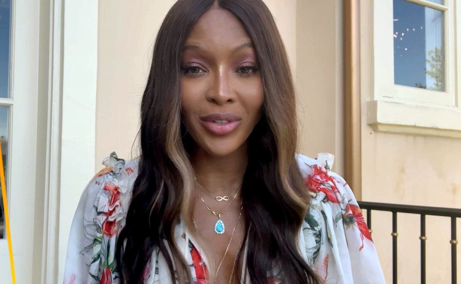 Naomi Campbell speaks to the camera.