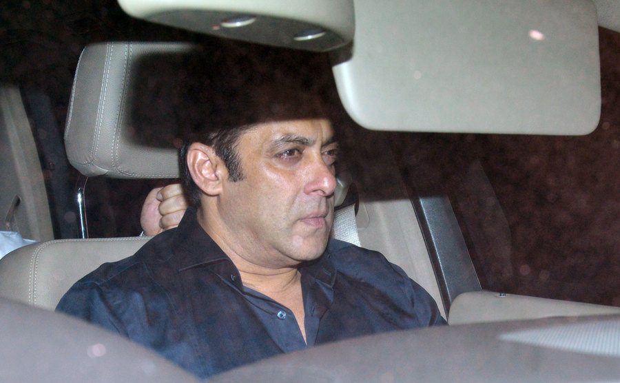 A photo of Salman Khan riding his car.