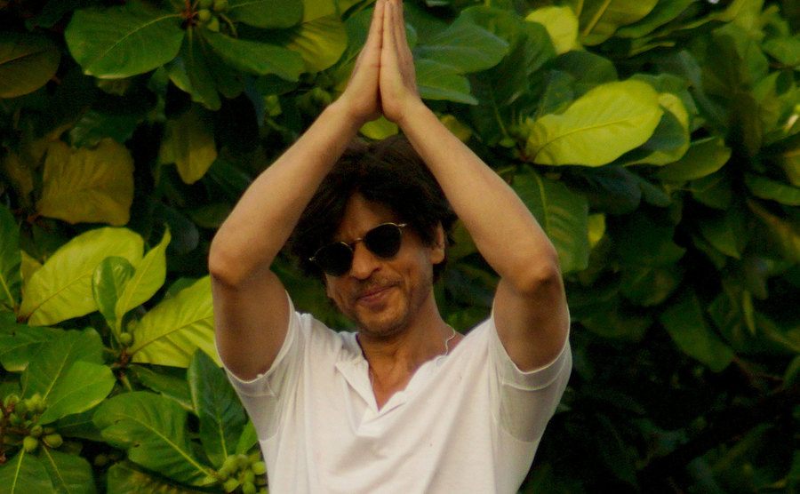 Shah Rukh Khan attends the wave hands with fans outside his house