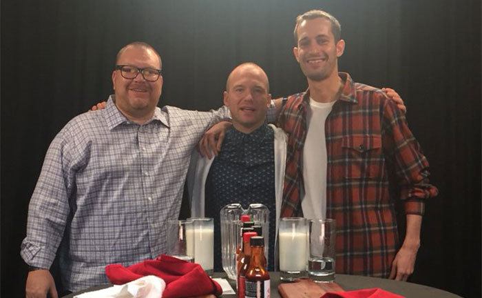 Chris Schonberger, Sean Evans, and Brett Baker pose together. 