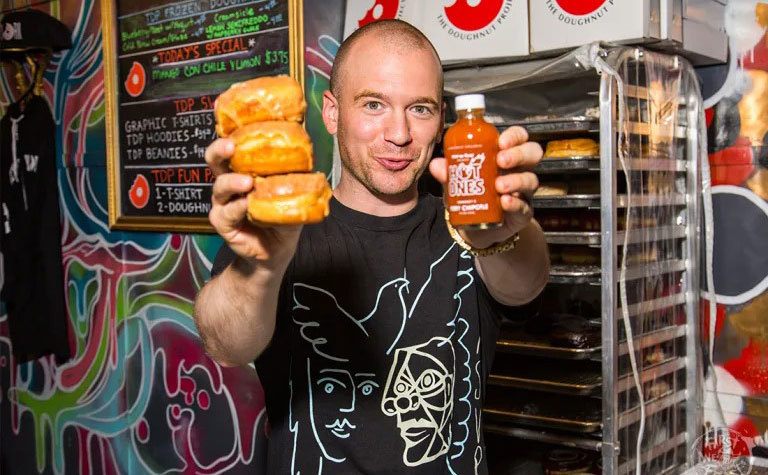 Sean Evans shows off his Hot One's Doughnut.