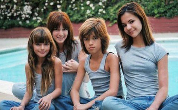 Bella Thorne and her siblings pose in the backyard by the pool.