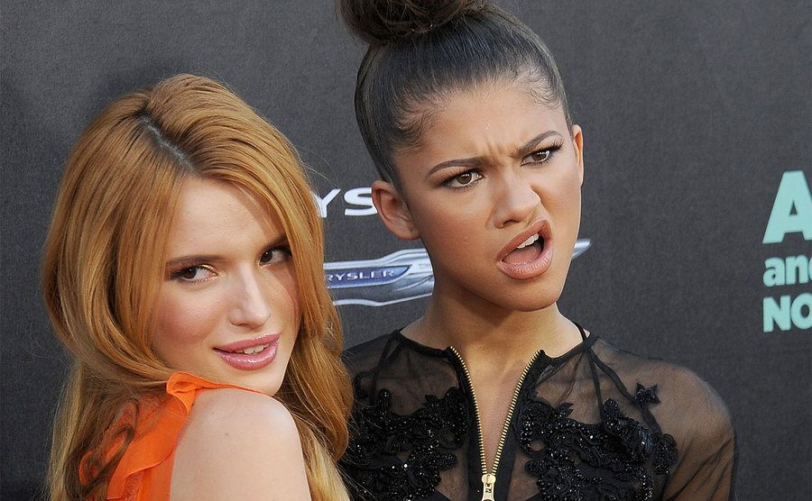 Bella Thorne and Zendaya arrive at a premiere.