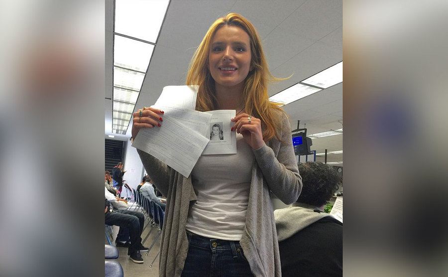 Bella Thorne is at the DMV getting her license.