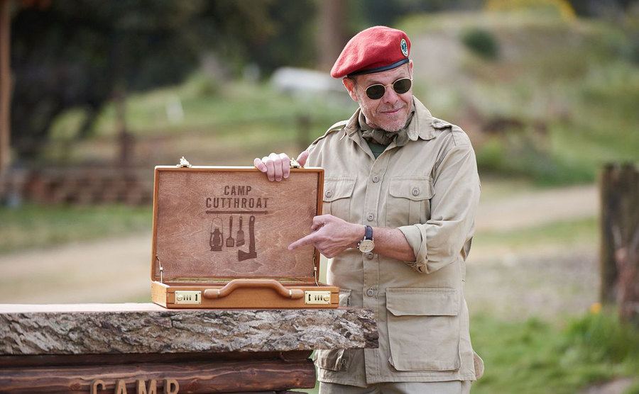 A still of Brown presenting competitors with a challenge in Cutthroat Kitchen.