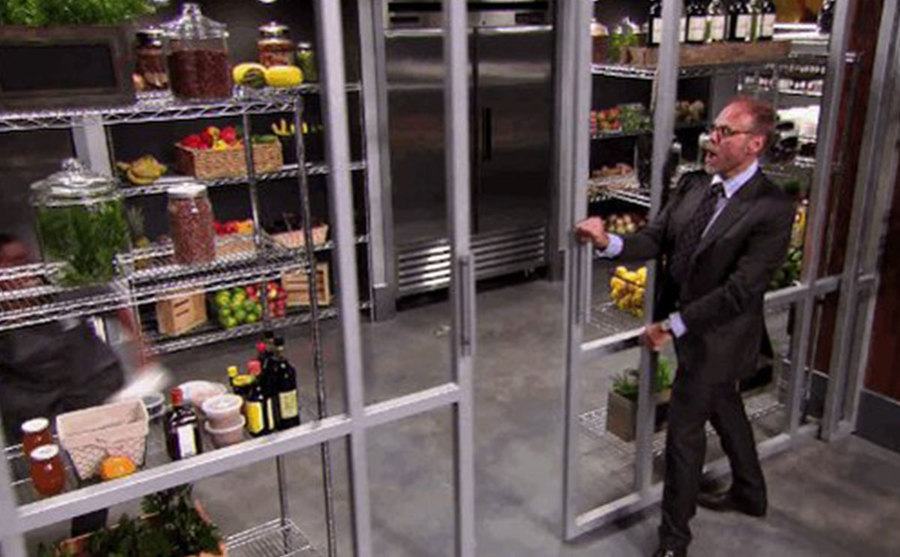 Brown stands next to the pantry.