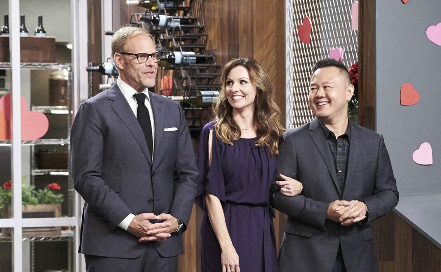 A still of Brown and the judges in the show.