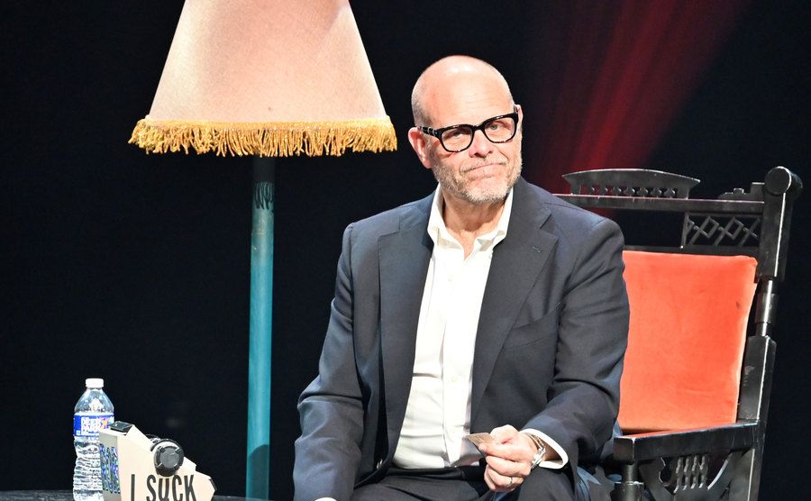 Alton Brown speaks on stage.