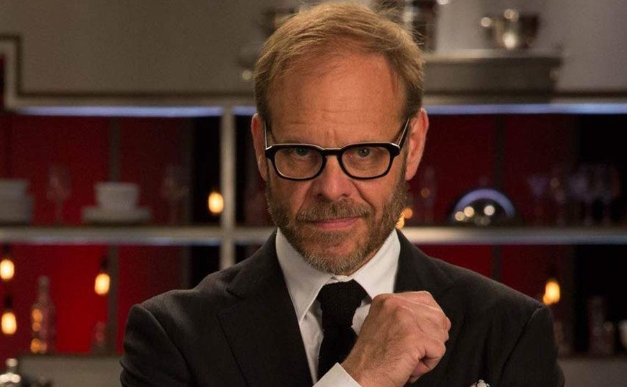 A still of Alton Brown during an episode.