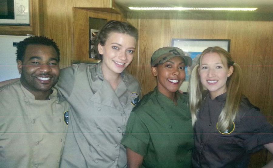Contestants take a picture together.