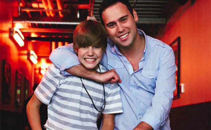 Bieber and Braun embrace backstage.