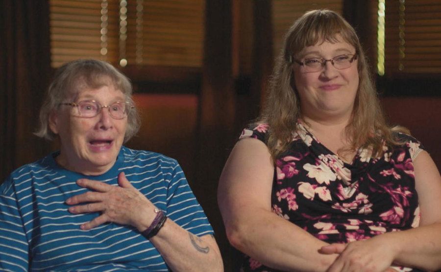 Mary Stavik and daughter Molly Brighton speak during an interview.