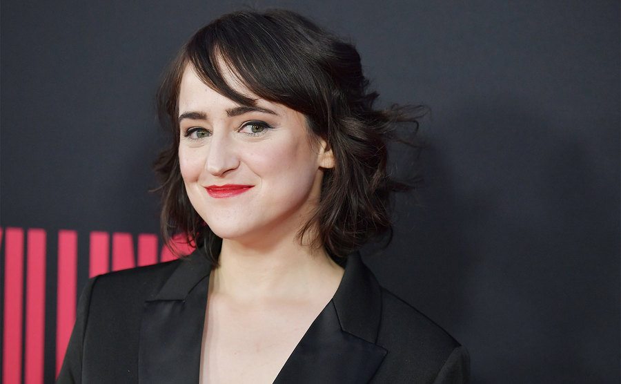 Mara Wilson poses on the red carpet.
