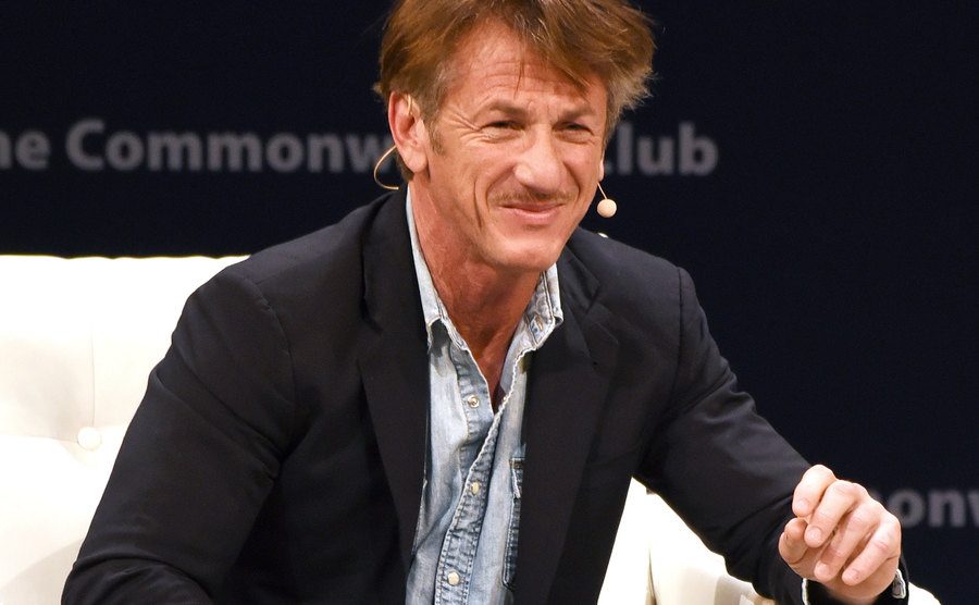 Sean Penn speaks on stage.