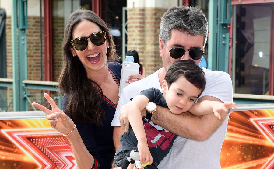 A photo of Lauren and Cowell with their son, Eric.