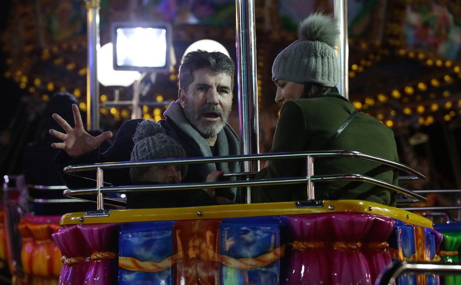 A photo of Cowell, Lauren, and Eric at Hyde Park Winter Wonderland.