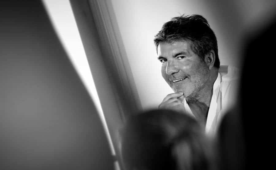 An image of Cowell during a photo shoot.