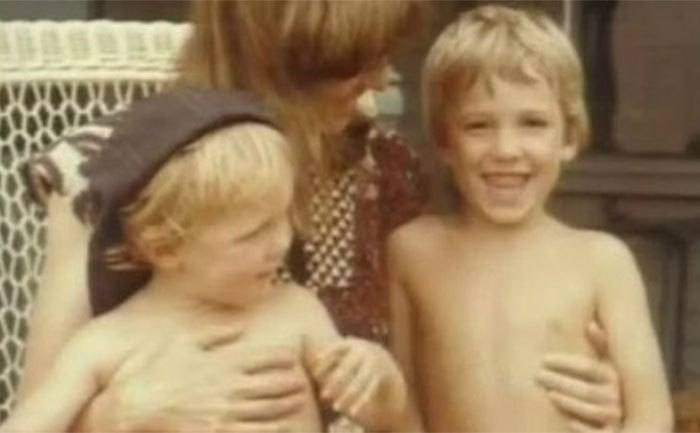 Casey and Ben take a photo with their mother. 