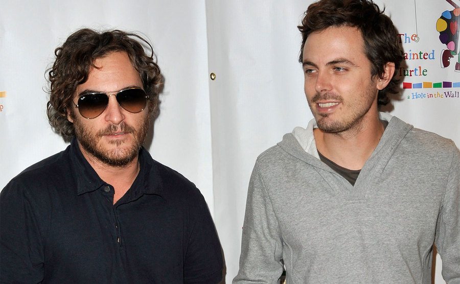 Joaquin Phoenix and Casey Affleck arrive at reading 