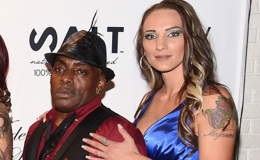 Rapper Coolio and Mimi attend an event.
