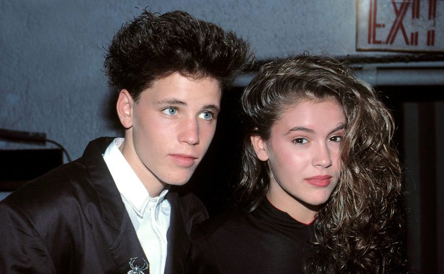 A photo of Haim and Alyssa Milano attending an event.