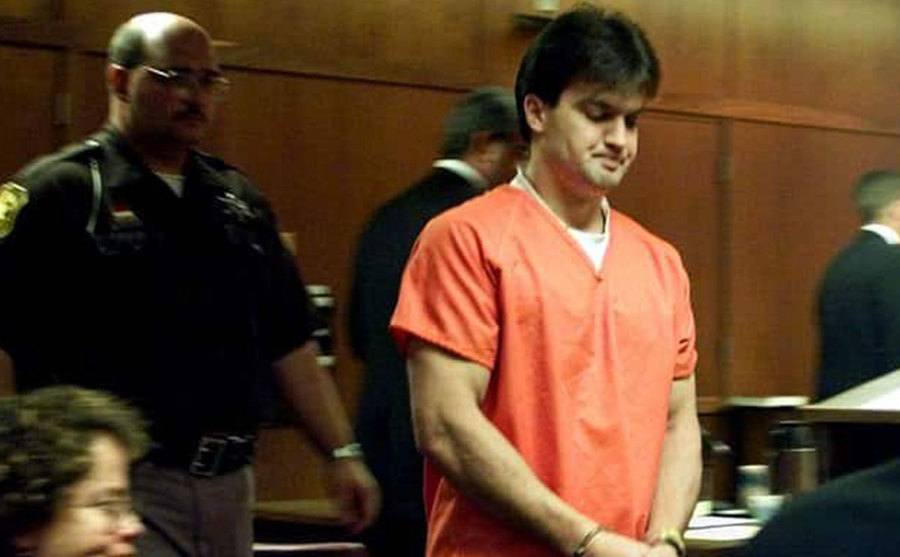 An image of Schmitz entering the courtroom.