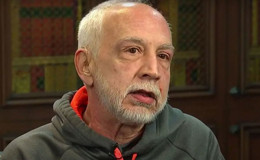 Scott’s brother speaks during an interview.