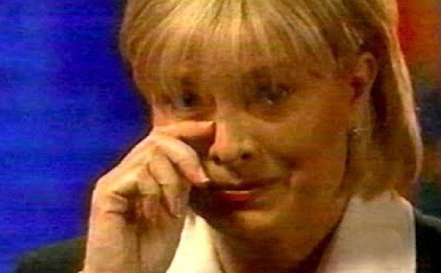 Jenny Jones cries after an interview.