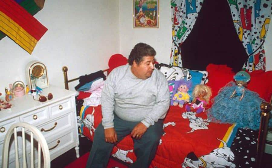 A photo of Sal Inghilleri sitting on Katie’s bed.